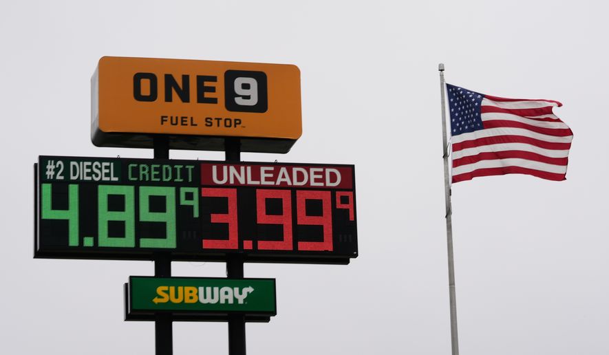 The American Flag flies next to a One9 Fuel Stop sign displaying gas prices for diesel and unleaded gas in Wilmington, Ohio, Wednesday, June 10, 2026. (AP Photo/Carolyn Kaster)