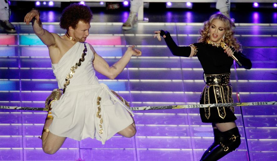 Andy Lewis appears during Madonna's halftime performance at the NFL Super Bowl XLVI football game between the New York Giants and the New England Patriots, Feb. 5, 2012, in Indianapolis. (AP Photo/Charlie Riedel, File)