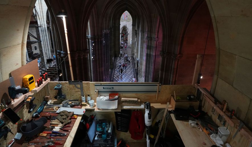 A makeshift work room is seen during the installation of a new organ at Prague's St. Vitus Cathedral that is coming to its final stages in Prague, Czech Republic, Tuesday, July 22, 2025. (AP Photo/Petr David Josek, File)