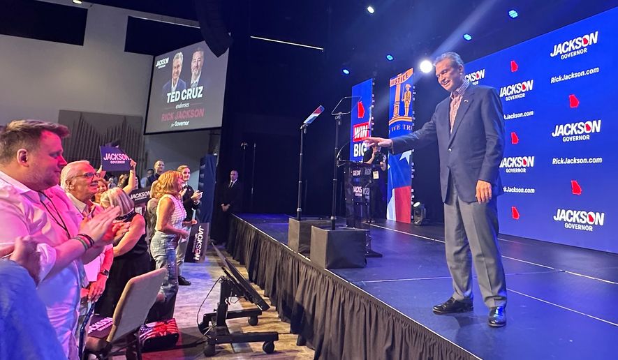 Georgia governor candidate Rick Jackson campaigns in Alpharetta, Ga., Monday, June 15, 2026, before the runoff against Lt. Gov Burt Jones on June 16. (AP Photo/Bill Barrow)