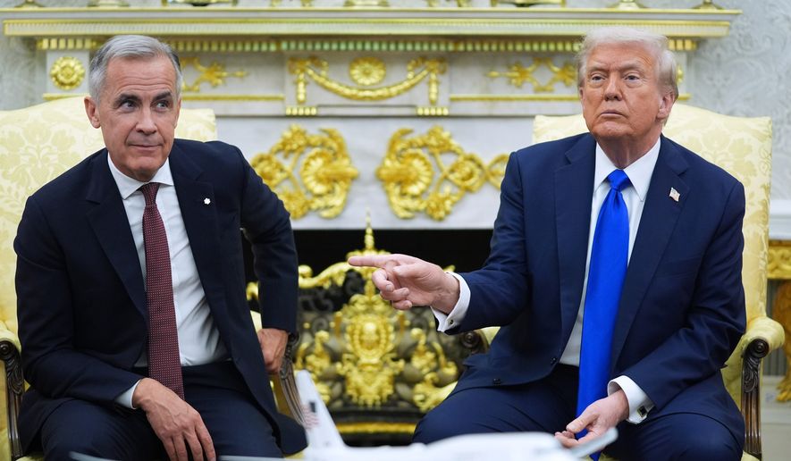 President Donald Trump and Canadian Prime Minister Mark Carney meet in the Oval Office of the White House, Oct. 7, 2025, in Washington. (AP Photo/Evan Vucci, File)