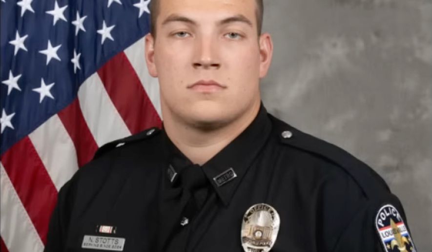 This photo released by the Louisville Metro Police in Kentucky shows former Louisville Metro Police officer Nathan A. Stotts in an official Louisville police portrait on Tuesday, June 2, 2026. (Louisville Metro Police via AP)