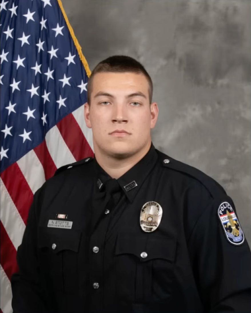 This photo released by the Louisville Metro Police in Kentucky shows former Louisville Metro Police officer Nathan A. Stotts in an official Louisville police portrait on Tuesday, June 2, 2026. (Louisville Metro Police via AP)