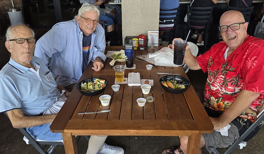 Bob Hilliard with fellow newspaper guys Jeff Cull and Bucky Fox in Fort Myers, Florida.