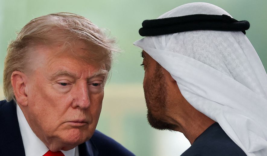 President Donald Trump listens to President of the United Arab Emirates (UAE) Sheikh Mohamed bin Zayed Al Nahyan at a working lunch with leaders of G7 and the Middle East in Evian-les-Bains, France, Tuesday, June 16, 2026. (Christian Hartmann/Pool Photo via AP)