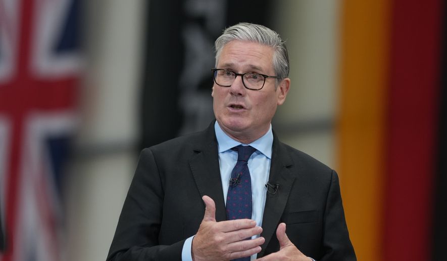 Britain's Prime Minister Keir Starmer speaks as he visits STARK, a leading defense tech company in Swindon, England, Friday, June 5, 2026. (AP Photo/Alastair Grant, Pool)