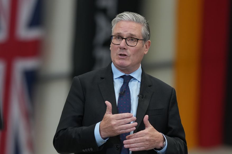 Britain's Prime Minister Keir Starmer speaks as he visits STARK, a leading defense tech company in Swindon, England, Friday, June 5, 2026. (AP Photo/Alastair Grant, Pool)