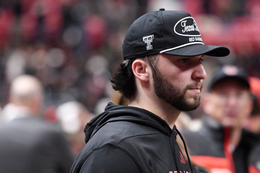 Cincinnati transfer and future Texas Tech quarterback Brendan Sorsby attends an NCAA college basketball game between Texas Tech and Houston, Jan. 24, 2026, in Lubbock, Texas. (AP Photo/Annie Rice, File)