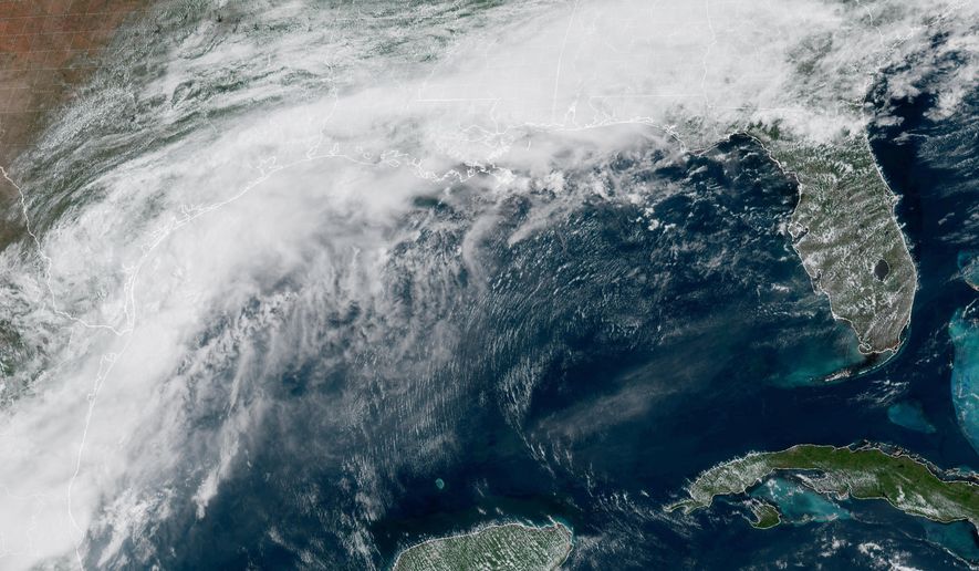 This GOES-19 GeoColor satellite image provided by NOAA, shows a storm system forming along the Gulf coast of Texas, on Tuesday, June 16, 2026. (NOAA via AP)