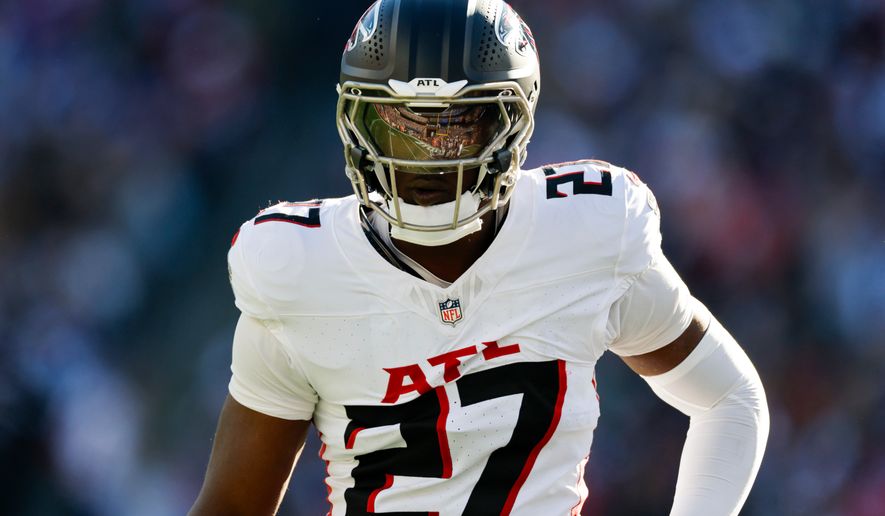 FILE - Atlanta Falcons linebacker James Pearce Jr. (27) prepares to defend during the first half of an NFL football game against the New England Patriots, Nov. 2, 2025, in Foxborough, Mass. (AP Photo/Greg M. Cooper, File)