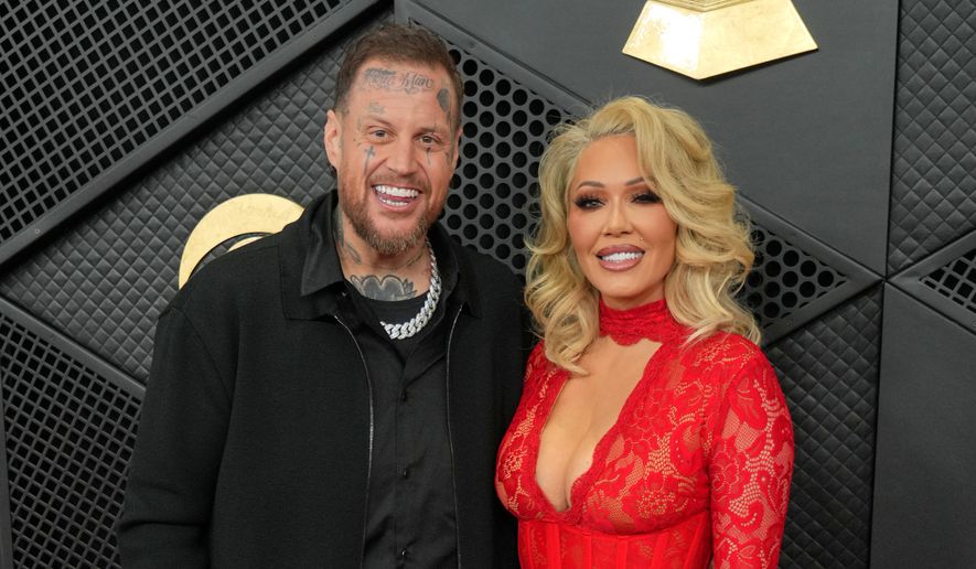 Jelly Roll, left, and Bunnie Xo appear at the 68th annual Grammy Awards in Los Angeles on Feb. 1, 2026. (Photo by Jordan Strauss/Invision/AP) **FILE**