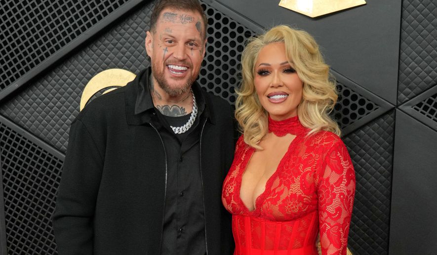 Jelly Roll, left, and Bunnie Xo appear at the 68th annual Grammy Awards in Los Angeles on Feb. 1, 2026. (Photo by Jordan Strauss/Invision/AP) **FILE**