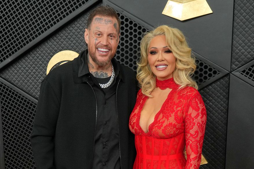 Jelly Roll, left, and Bunnie Xo appear at the 68th annual Grammy Awards in Los Angeles on Feb. 1, 2026. (Photo by Jordan Strauss/Invision/AP) **FILE**