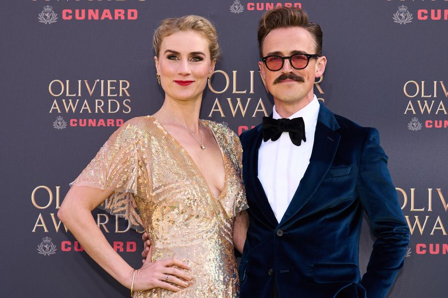 Jessica Swale, left, and Tom Fletcher appear at the Olivier Awards in London on April 12, 2026. (Photo by Scott A Garfitt/Invision/AP, File)