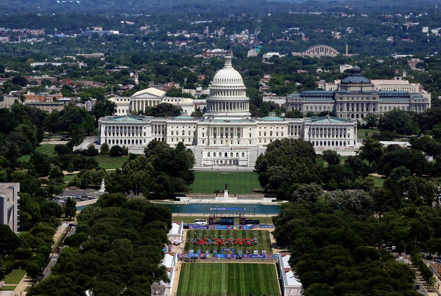The U.S. Capitol and National Mall are seen as the set up for the America 250 celebration, in Washington, Saturday, June 13, 2026. (AP Photo/Rahmat Gul)