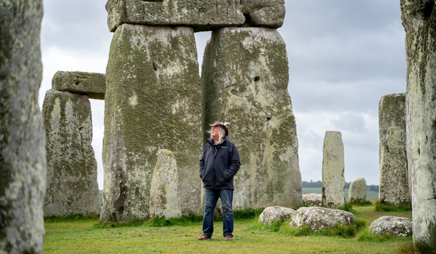 This photo provided by Wessex Archaeology shows archaeologist Phil Harding standing at Stonehenge in May 2026, near Salisbury, England. (Wessex Archaeology via AP)