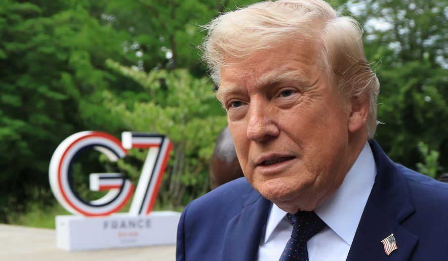 U.S. President Donald Trump arrives to attend a musical interlude before a gala dinner as part of the G7 summit, in Evian-les-Bains, France, Tuesday June 16, 2026. (Ludovic MARIN/Pool Photo via AP)