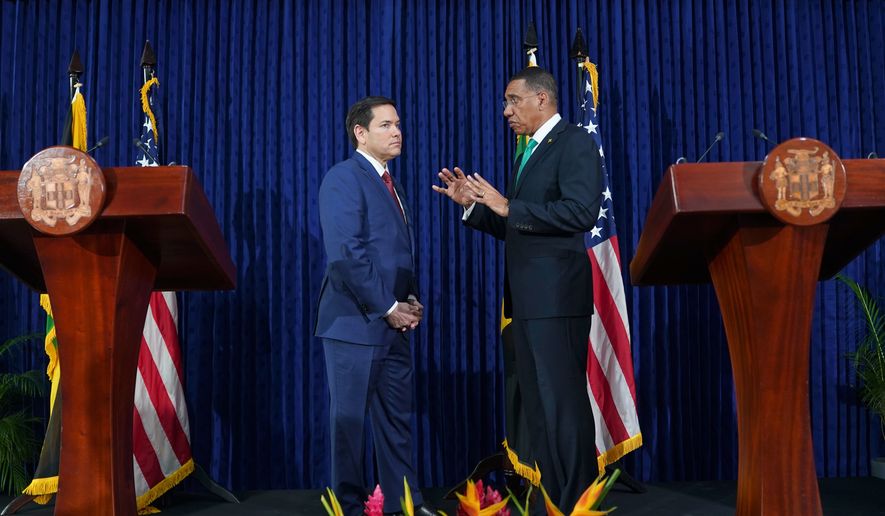 U.S. Secretary of State Marco Rubio, left, and Jamaica's Prime Minister Andrew Holness speak after giving a joint news conference at the office of the prime minister in Kingston, Jamaica, March 26, 2025. (Nathan Howard/Pool Photo via AP, File)