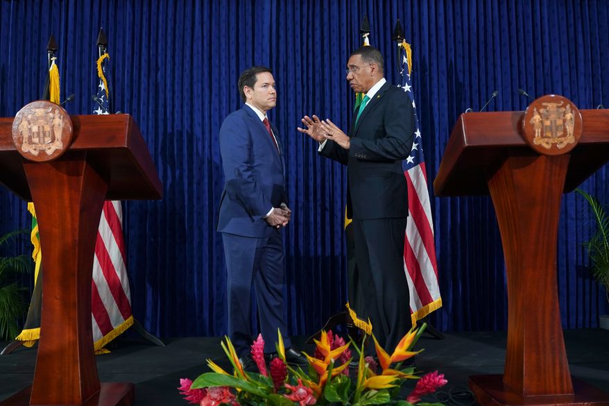 FILE - U.S. Secretary of State Marco Rubio, left, and Jamaica's Prime Minister Andrew Holness speak after giving a joint news conference at the office of the prime minister in Kingston, Jamaica, March 26, 2025. (Nathan Howard/Pool Photo via AP, File)