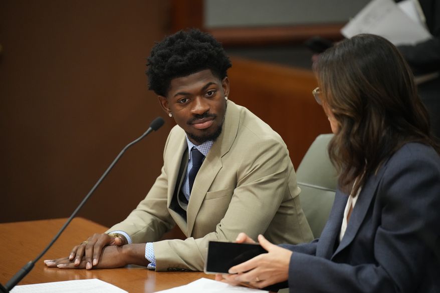 Lil Nas X, whose legal name is Montero Lamar Hill, appears in court on March 12, 2026, in Los Angeles, charged with four felony counts, including three counts of battery with injury on a police officer. (Daniel Cole/Pool Photo via AP, File)