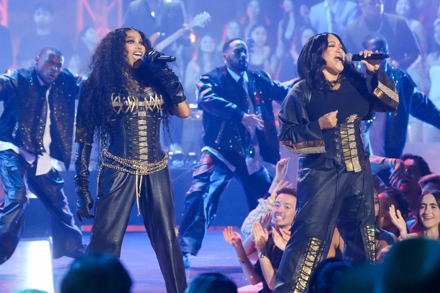 Sandra Denton, left, and Cheryl James, of Salt-N-Pepa, perform at the IHeartRadio Music Awards in Los Angeles on March 26, 2026. (AP Photo/Chris Pizzello, File)