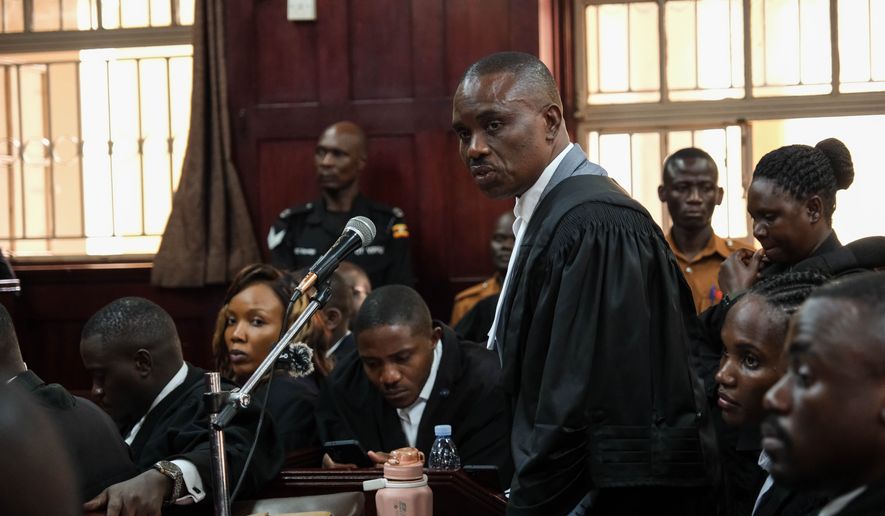 Erias Lukwago, lawyer for Uganda's veteran opposition leader Kizza Besigye, speaks during a court session on a ruling on Besigye's bail application at the High Court in Kampala, Uganda, Monday, Dec. 29, 2025. (AP Photo/Hajarah Nalwadda)