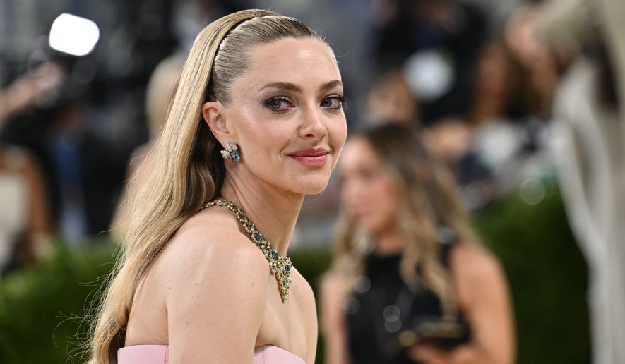 Amanda Seyfried arrives at The Metropolitan Museum of Art's Costume Institute benefit gala celebrating the opening of the "Costume Art" exhibition on Monday, May 4, 2026, in New York. (Photo by Evan Agostini/Invision/AP)