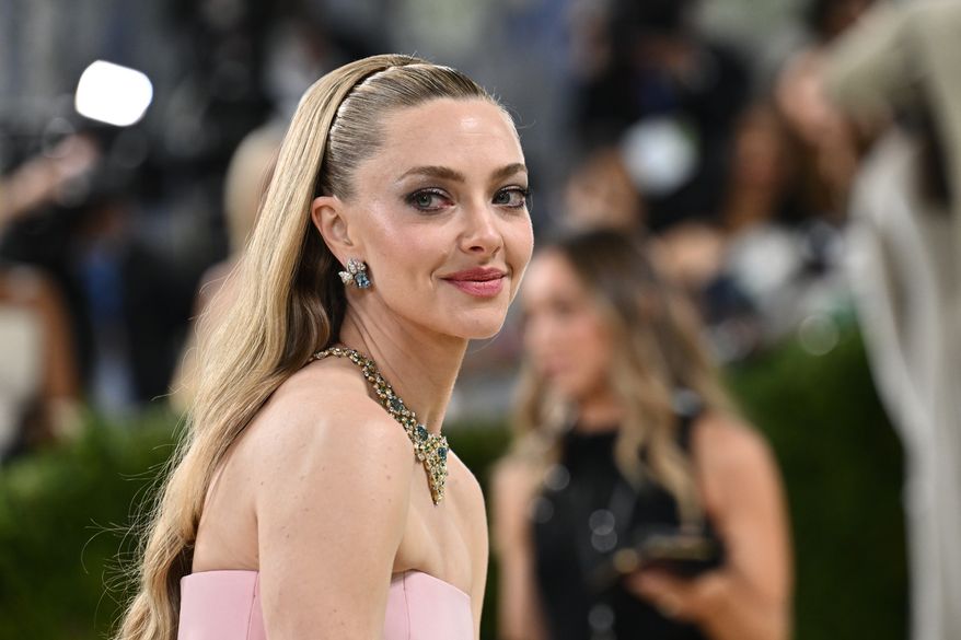 Amanda Seyfried arrives at The Metropolitan Museum of Art's Costume Institute benefit gala celebrating the opening of the "Costume Art" exhibition on Monday, May 4, 2026, in New York. (Photo by Evan Agostini/Invision/AP)