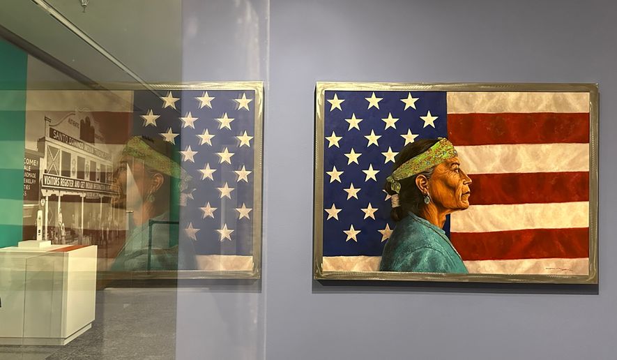 A painting by Navajo artist Kee Yazzie is displayed as part of the "Stars, Stripes and First Americans" exhibition at the Museum of Indian Arts and Culture in Santa Fe, N.M., on Monday, May 11, 2026. (AP Photo/Susan Montoya Bryan)