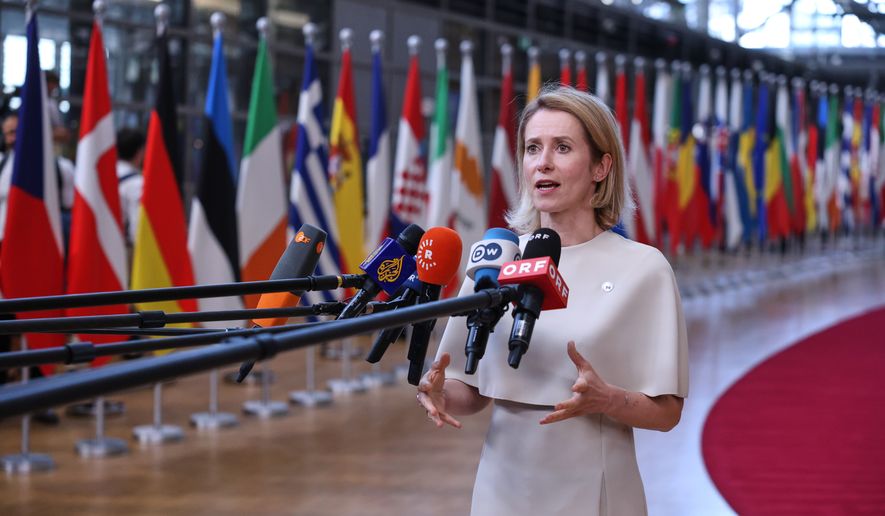 European Union foreign policy chief Kaja Kallas talks to journalists as she arrives for the EU summit in Brussels, Thursday, June 18, 2026. (AP Photo/Omar Havana) ** FILE **