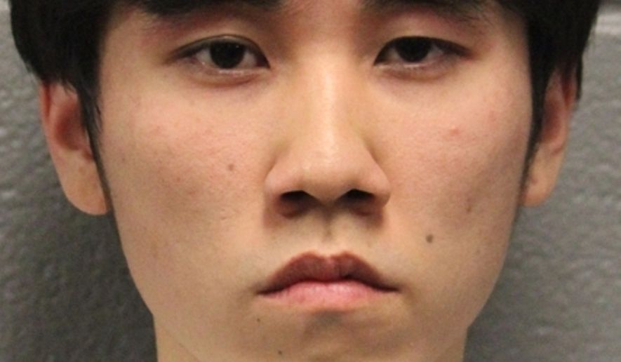 This booking photo released by the Chicago Police Department on Wednesday, June 17, 2026, shows Merlin Lu, who has been charged with a hate crime and other offenses in the burning of a cross in Chicago's Grant Park. (Chicago Police Department via AP)
