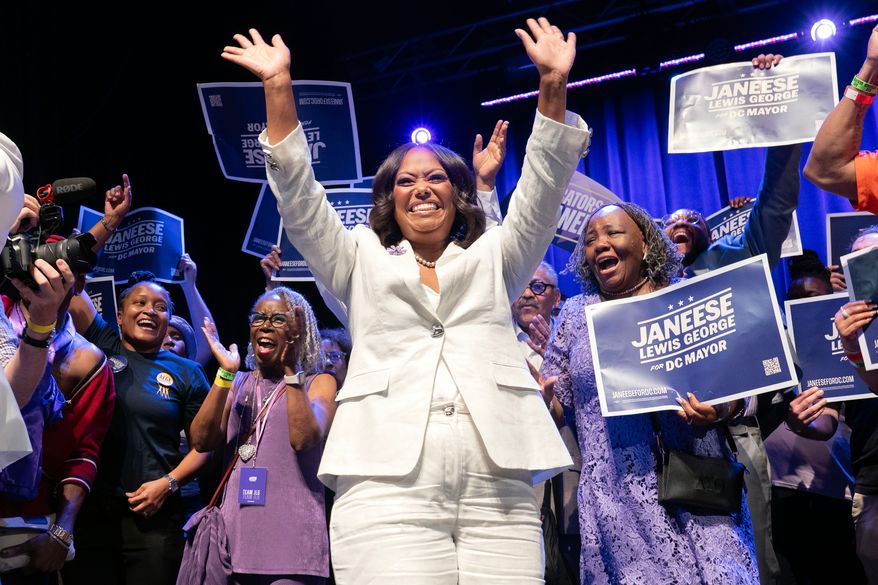 D.C. Council member Janeese Lewis George waves to the crowd as she celebrates after winning D.C. Mayor primary election during an election night party at the Howard Theatre Tuesday, June 16, 2026, in Washington. (AP Photo/Jose Luis Magana)