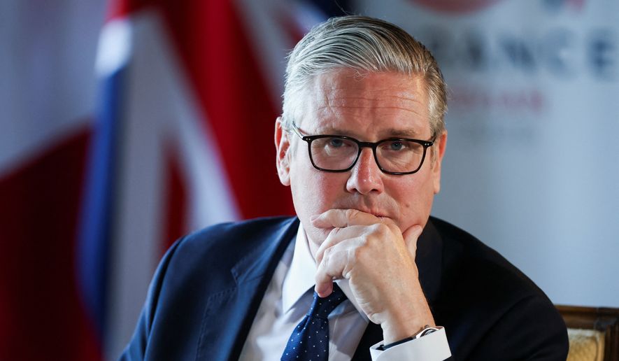 Britain's Prime Minister Keir Starmer speaks to the members of the media on the sidelines of the G7 summit, in Thonon-les-Bains, France, Wednesday, June 17, 2026. (Isabel Infantes/Pool Photo via AP)