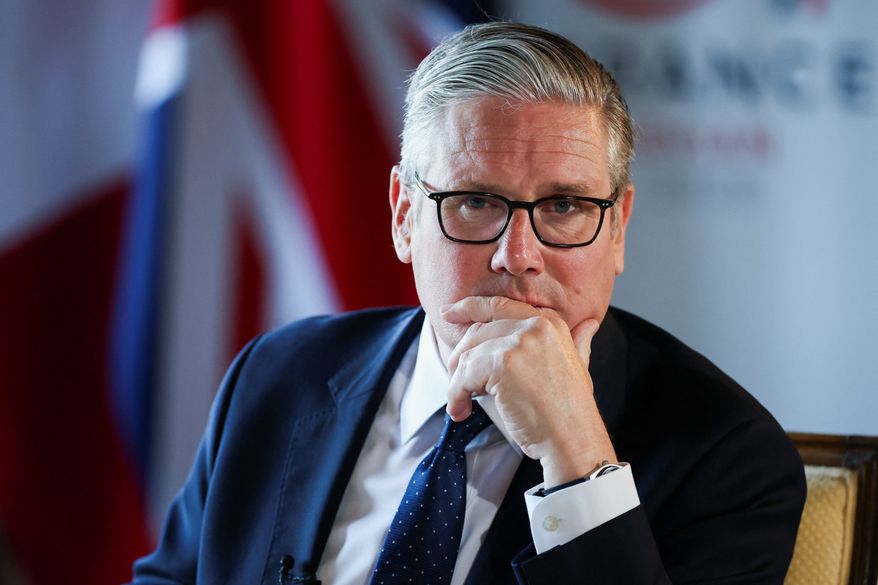 Britain's Prime Minister Keir Starmer speaks to the members of the media on the sidelines of the G7 summit, in Thonon-les-Bains, France, Wednesday, June 17, 2026. (Isabel Infantes/Pool Photo via AP)