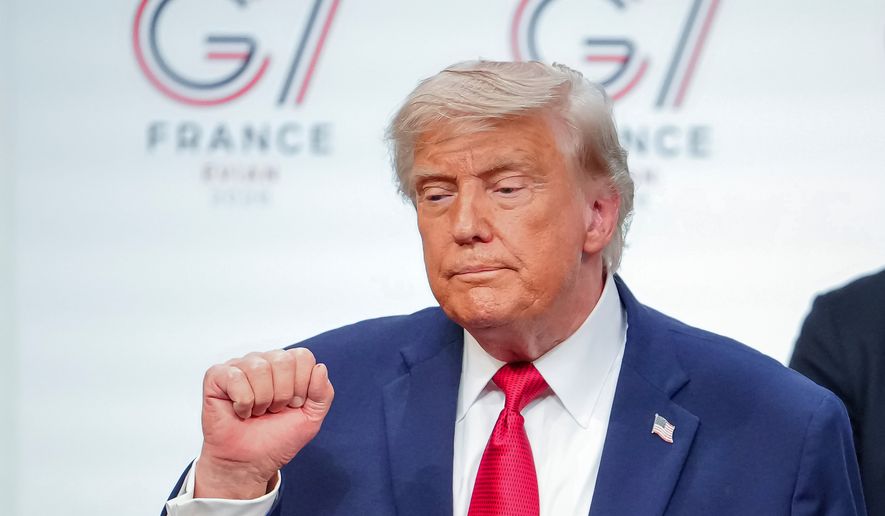 U.S. President Donald Trump gestures as he leaves the stage after a media conference at the end of the G7 summit in Evian-les-Bains, France, Wednesday, June 17, 2026. (AP Photo/Vadim Ghirda)