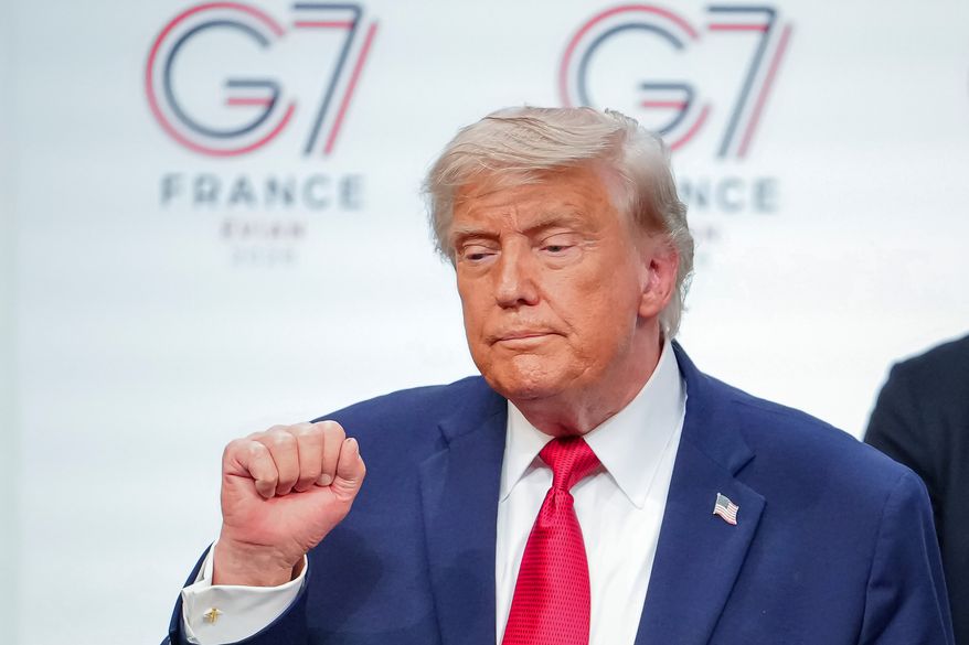U.S. President Donald Trump gestures as he leaves the stage after a media conference at the end of the G7 summit in Evian-les-Bains, France, Wednesday, June 17, 2026. (AP Photo/Vadim Ghirda)