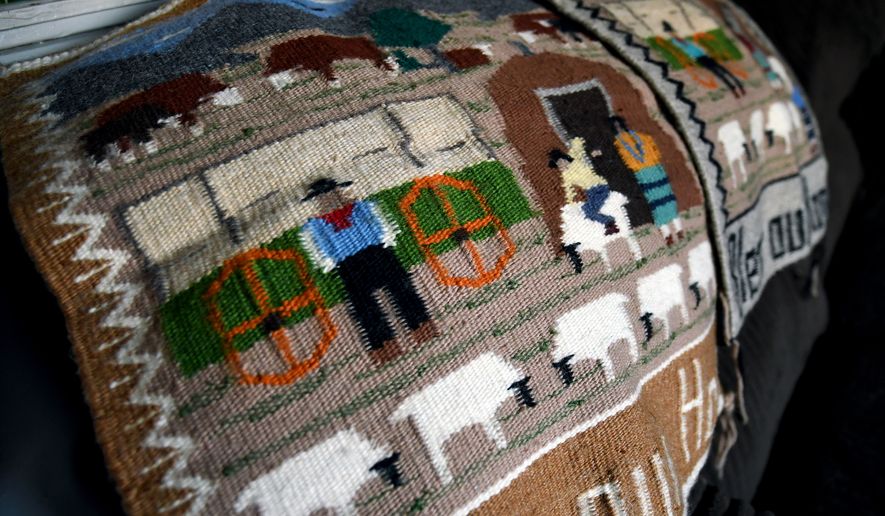 FILE - Weavings created by Ella Mae Begay, who went missing from her home, are displayed in her son's home in Denver, April 2, 2026. (AP Photo/Thomas Peipert,File)