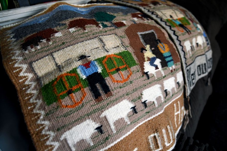 FILE - Weavings created by Ella Mae Begay, who went missing from her home, are displayed in her son's home in Denver, April 2, 2026. (AP Photo/Thomas Peipert,File)