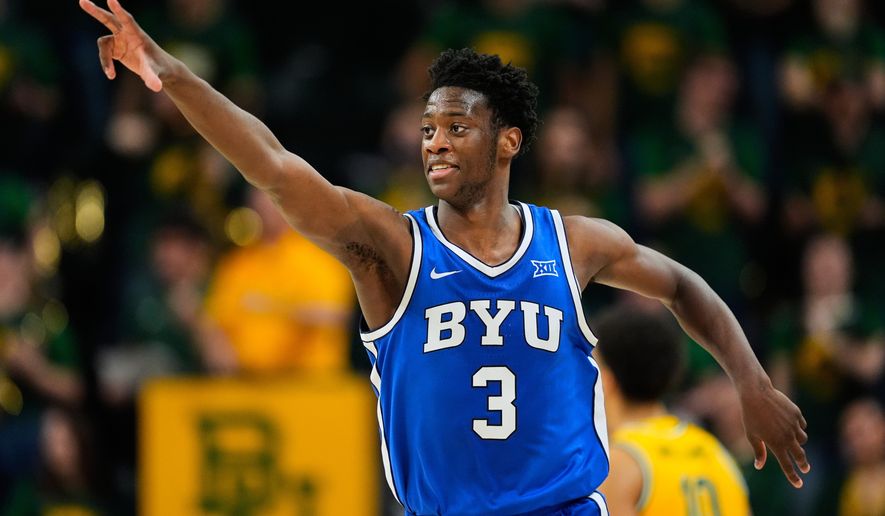 BYU forward AJ Dybantsa celebrates his three-pointer in the second half of an NCAA college basketball game against Baylor, Feb. 10, 2026, in Waco, Texas. (AP Photo/Tony Gutierrez, File)