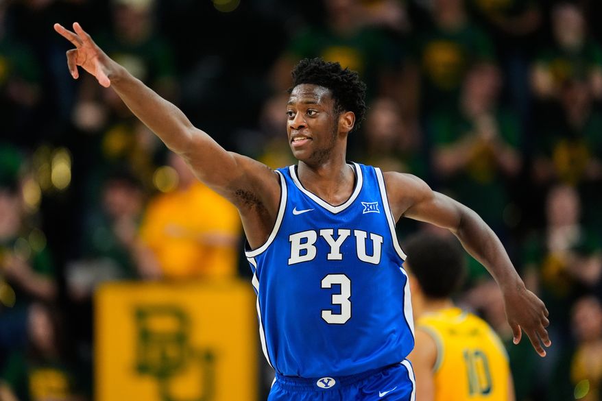BYU forward AJ Dybantsa celebrates his three-pointer in the second half of an NCAA college basketball game against Baylor, Feb. 10, 2026, in Waco, Texas. (AP Photo/Tony Gutierrez, File)