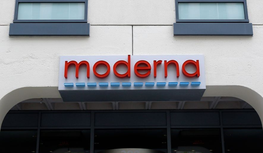 A sign marks an entrance to a Moderna building in Cambridge, Mass., May 18, 2020. (AP Photo/Bill Sikes, File)prnto
