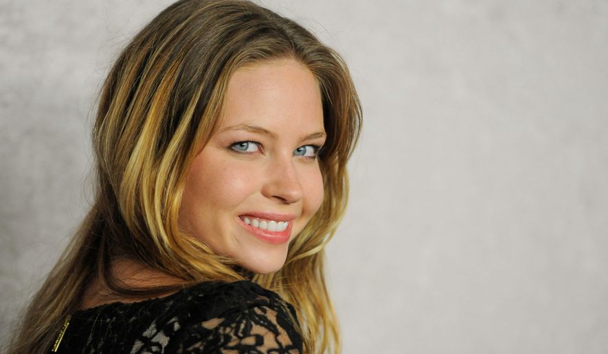 FILE - Actor Daveigh Chase poses at the Season 5 premiere of HBO series "Big Love," in Los Angeles on Jan. 12, 2011. (AP Photo/Chris Pizzello, File)