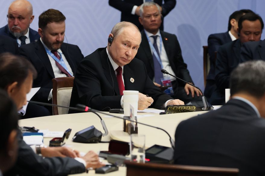 Russian President Vladimir Putin, center, attends the Russia-ASEAN summit in Kazan, Russia, Thursday, June 18, 2026. (Mikhail Metzel/Sputnik, Kremlin Pool Photo via AP)