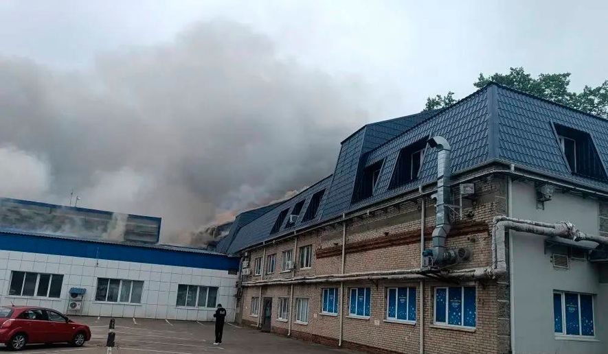 This photo provided by Moscow Region Governor Andrei Vorobyev's official telegram channel shows smoke rising from a damaged building after a Ukrainian drone attack outside Moscow on Thursday, June 18, 2026. (Moscow Region Governor Andrei Vorobyev's official telegram channel via AP)