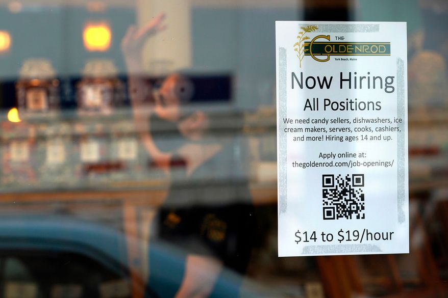FILE - A sign advertises for help The Goldenrod, a popular restaurant and candy shop, Wednesday, June 1, 2022, in York Beach, Maine. (AP Photo/Robert F. Bukaty, File)