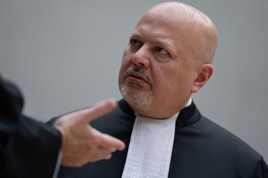 FILE - Chief Prosecutor Karim Khan talks while waiting for former Philippine President Rodrigo Duterte to appear via video link before the International Criminal Court (ICC) in The Hague, Netherlands, Friday, March 14, 2025. (AP Photo/Peter Dejong, Pool, File)