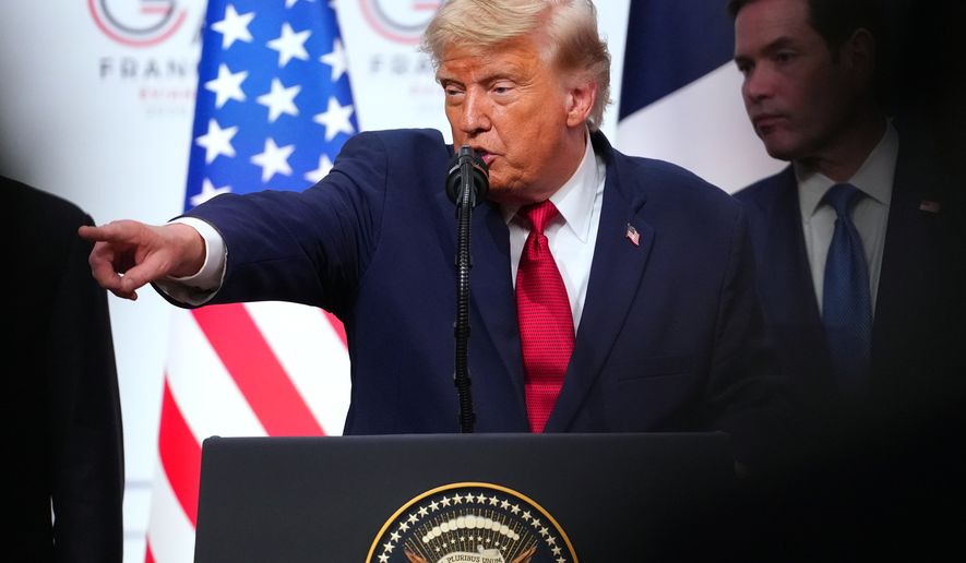 U.S. President Donald Trump, center, takes questions during a media conference at the end of the G7 summit in Evian-les-Bains, France, Wednesday, June 17, 2026. (AP Photo/Vadim Ghirda)