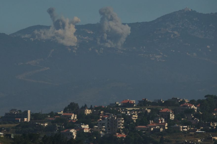 Smokes rise to the sky following an Israeli military strike in southern Lebanon as seen from northern Israel, Friday, June 19, 2026. (AP Photo/Leo Correa)