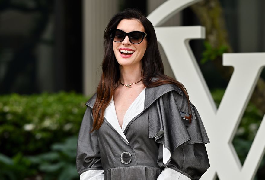 Anne Hathaway attends the Louis Vuitton Cruise 2027 Collection fashion show at The Frick Collection on Wednesday, May 20, 2026, in New York. (Photo by Evan Agostini/Invision/AP)