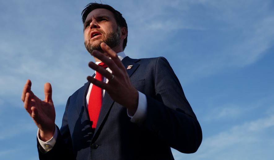 U.S. Vice President JD Vance speaks to members of the media before boarding Air Force Two at Emmen Military Air Base, Emmen, Switzerland, Monday, June 22, 2026, after the U.S. and Iran held high-level talks at the Lake Lucerne Summit. (Nathan Howard/Pool Photo via AP)